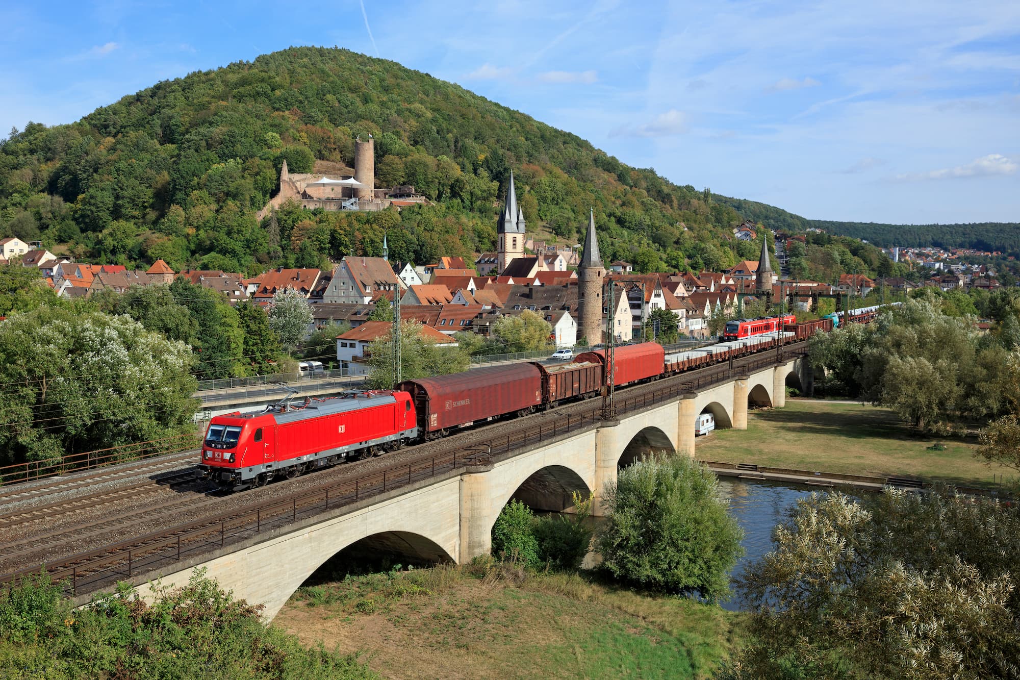 Single wagon train crosses a bridge